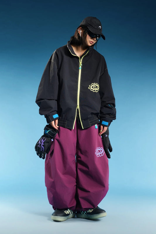 OddyEddy Starlight Purple baggy snowboard pants styled with complete logo