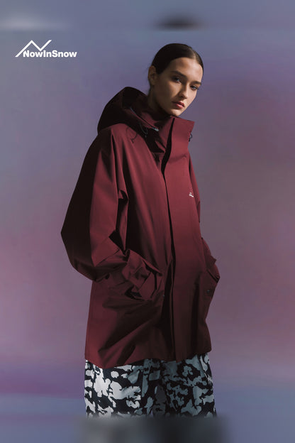 NIS longline ski snowboard jacket for women in Chestnut Berry Red, three-quarter view