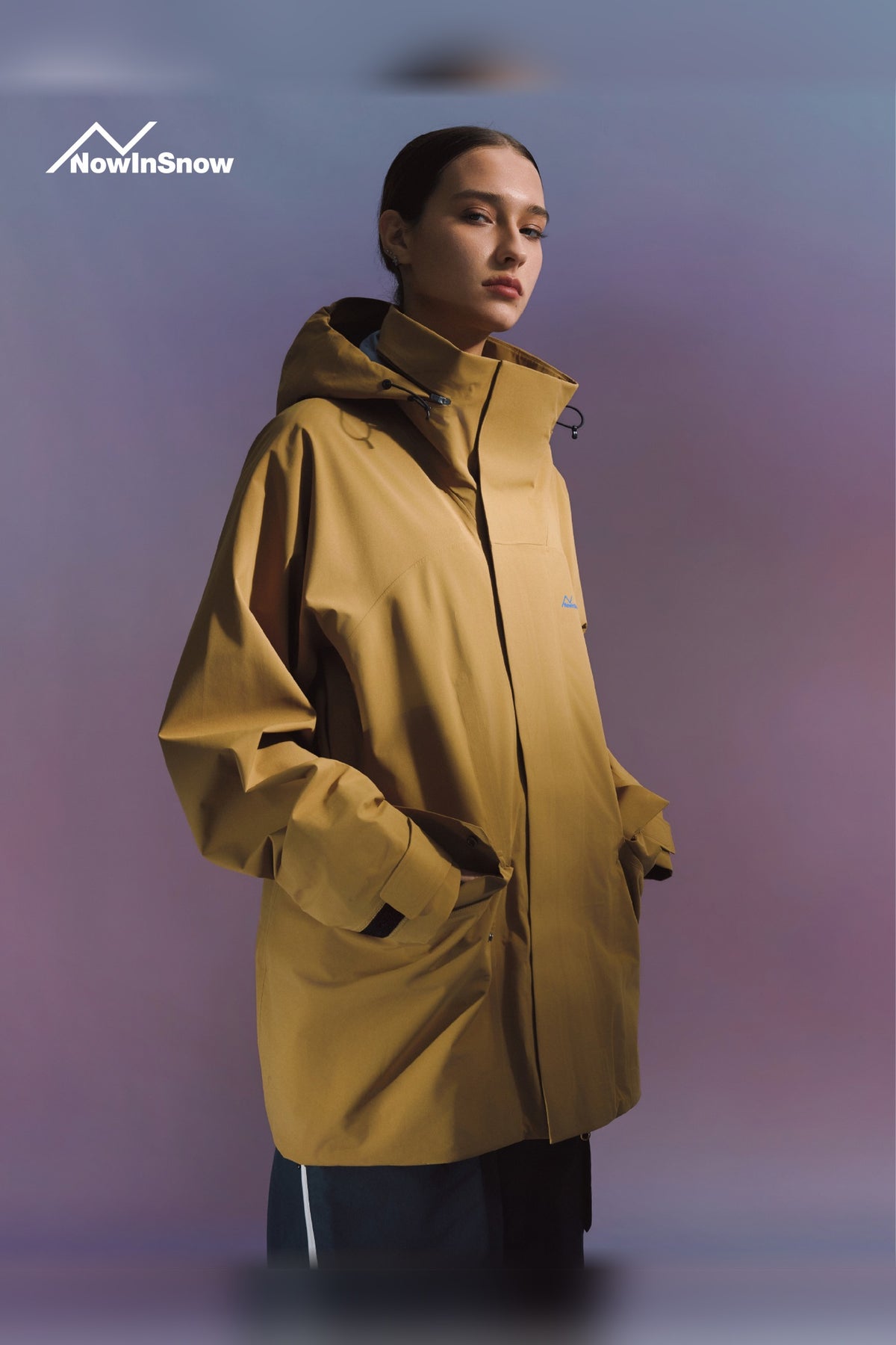 NIS Oak Brown longline ski jacket for women, three-quarter view