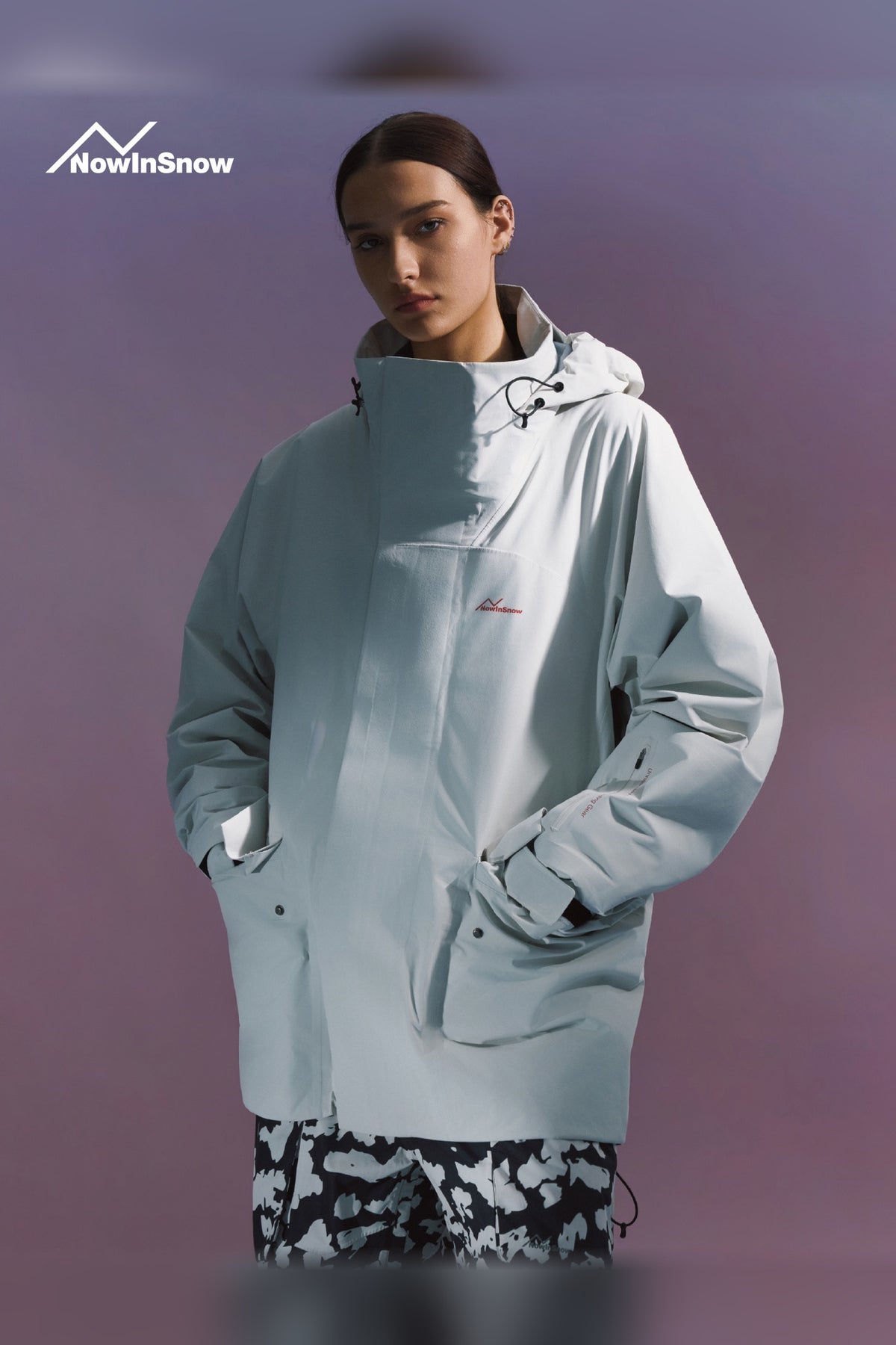 NIS longline ski snowboard jacket for women in Quartz White, front view