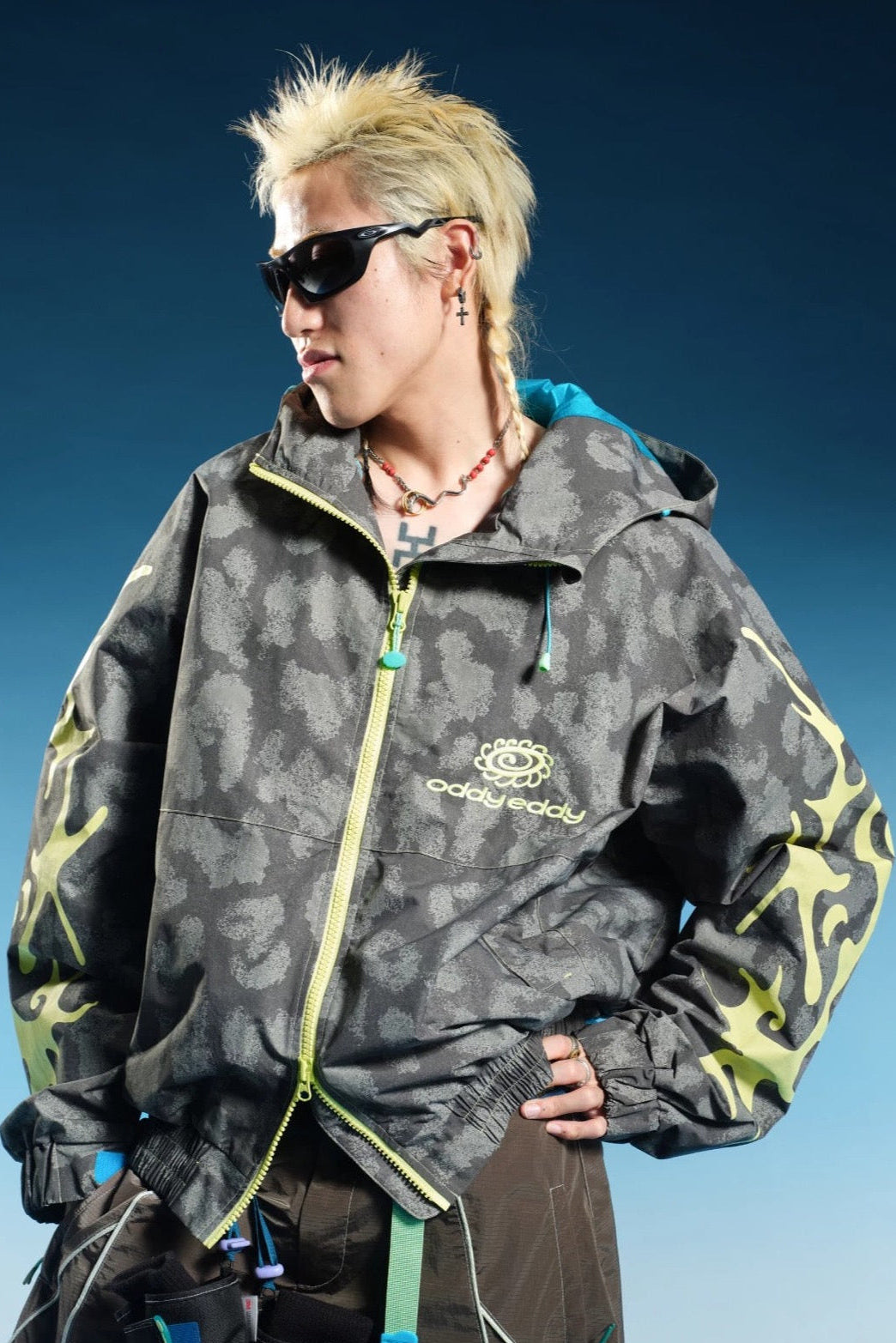 OddyEddy Thorn Grey ski and snowboard jacket front detail with complete chest logo
