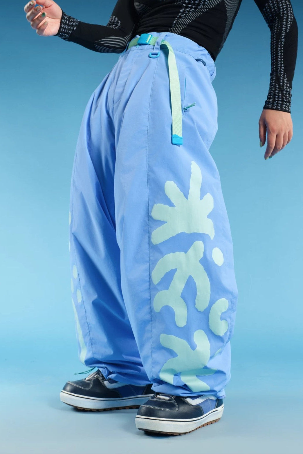 OddyEddy Totem Sky Blue snowboard pants side artwork and belt detail