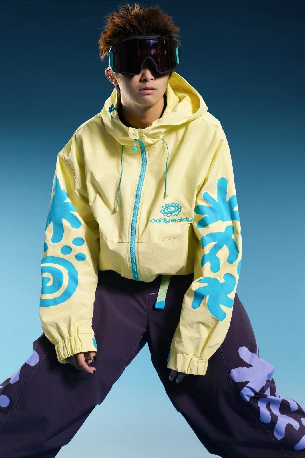 OddyEddy Totem Yellow unisex ski and snowboard jacket front lifestyle view