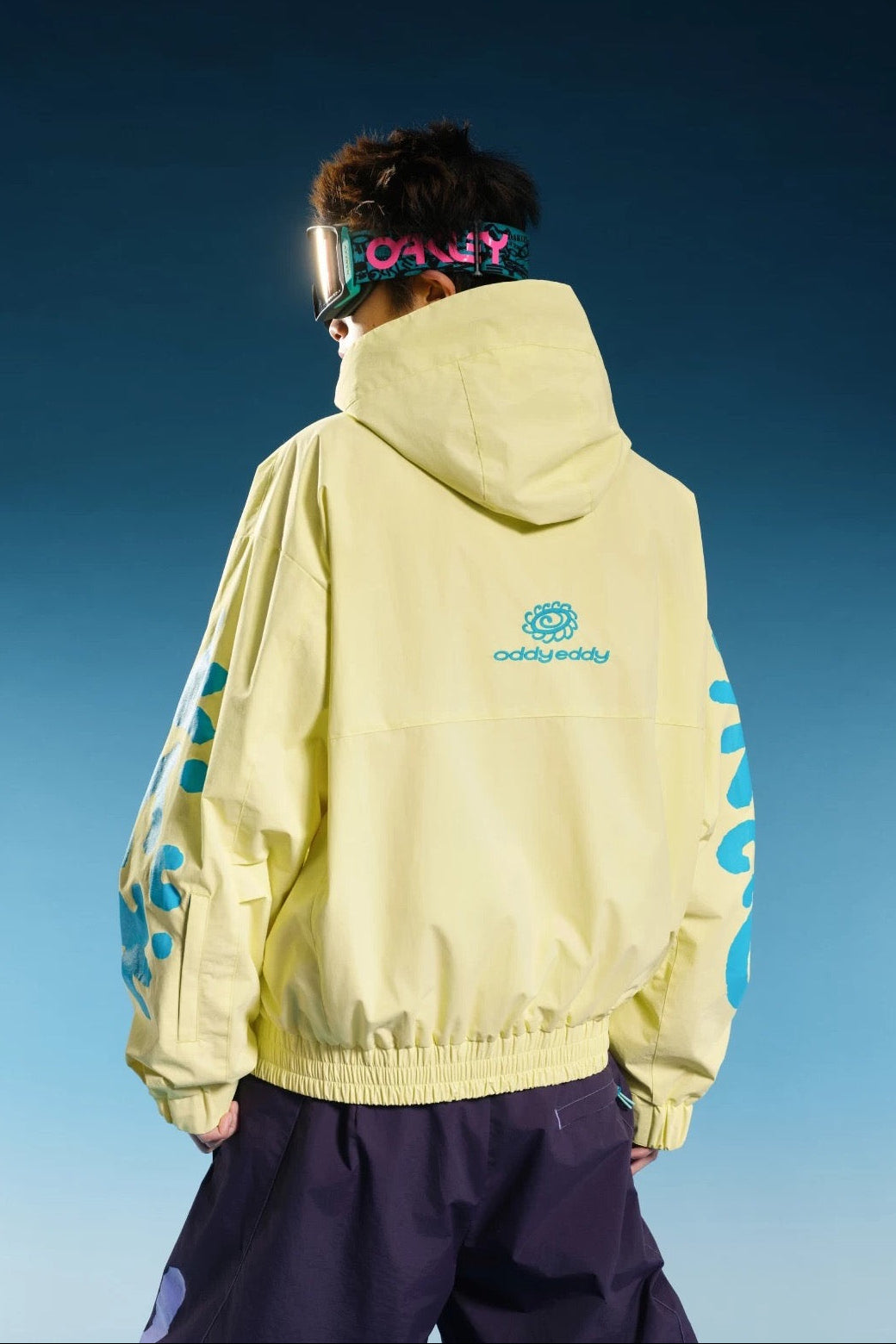 OddyEddy Totem Yellow jacket back view with complete logo