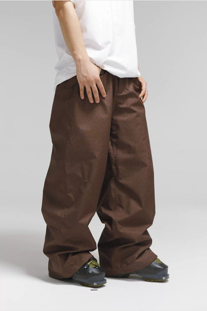 Winter Ticket dark brown leather-look oversized snow pants, front angled view