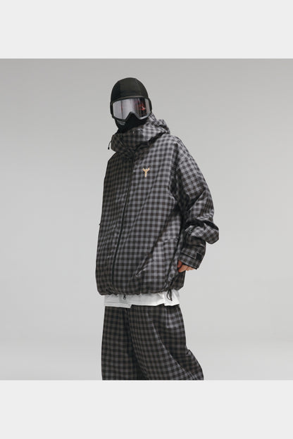 Black-grey plaid jacket angled view showing oversized fit and sleeve pocket