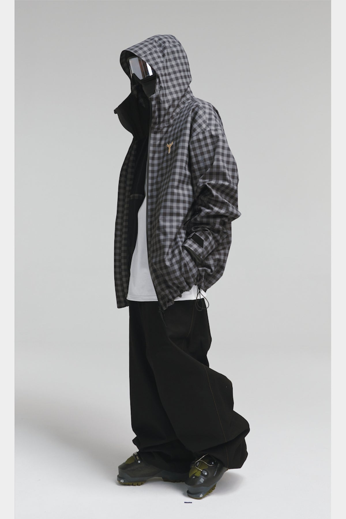 Black-grey plaid ski jacket open-front side view; pants and accessories sold separately