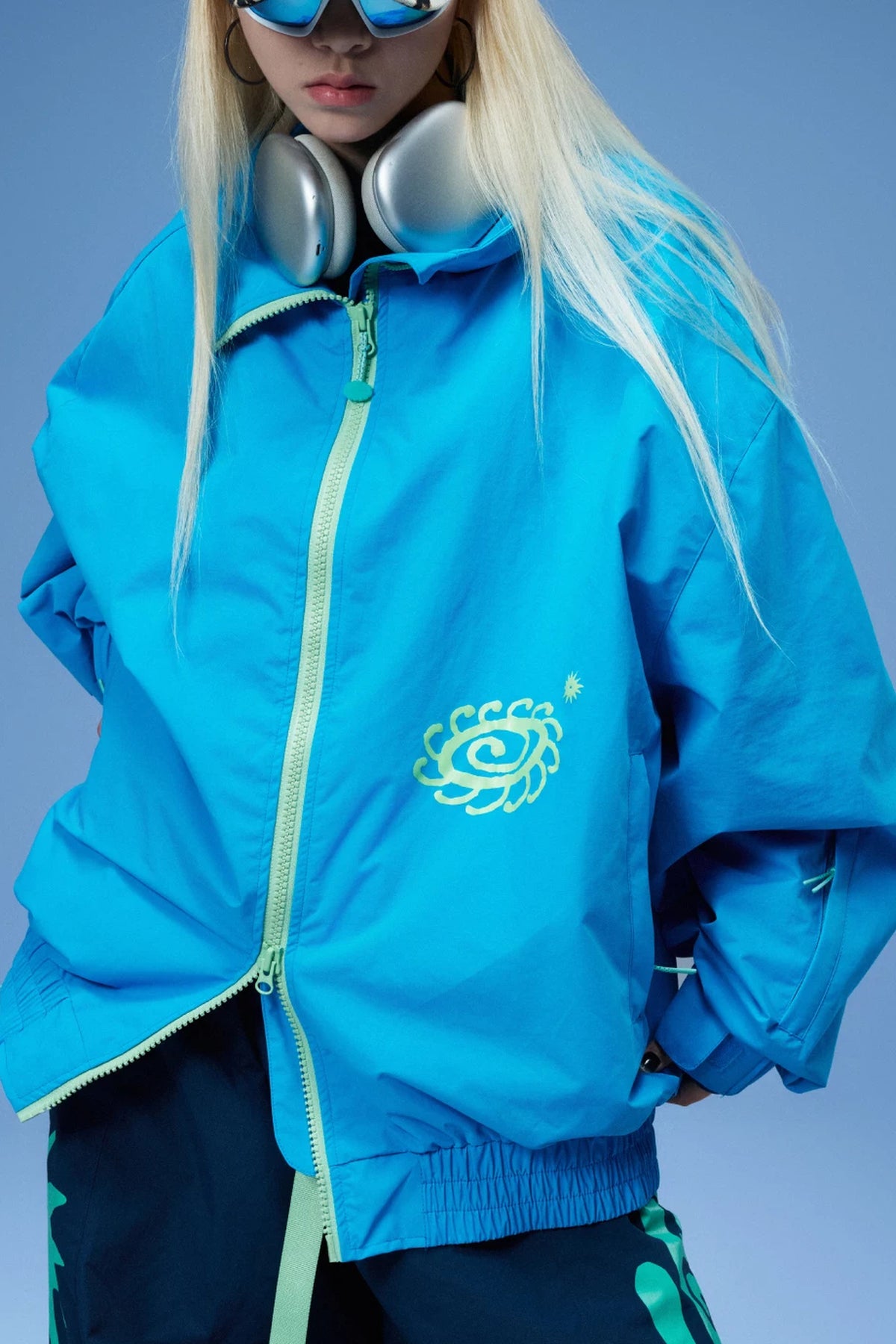 OddyEddy Zima Blue ski and snowboard jacket front studio close-up